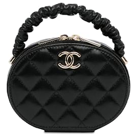 Chanel-Sac à main oval en cuir d'agneau froncé noir CC de Chanel-Noir
