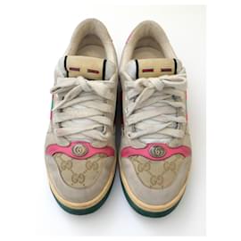 Gucci-Coolest Gucci Screener vintage look trainers. Worn a handful of times and come with box, dustbags and info cards. Made from signature monogram canvas with red and green webbing and red leather trims. Have a coupe of marks form wear but these are supposed to look vintage. Size 36.5. Measures approx - 10” heel to toe.-Beige