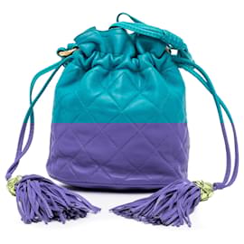 Chanel-Sac seau à cordon en cuir d'agneau matelassé bleu Chanel avec pompon-Bleu,Turquoise