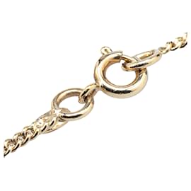 Chanel-Pendentif en forme de rouge à lèvres CC en or plaqué Chanel-Doré