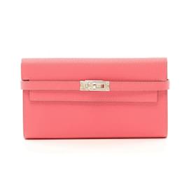 Hermès-Portefeuille long bi-fold Hermes Kelly en rose-Rose