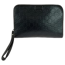 Gucci-Clutch em couro preto Guccissima da Gucci-Preto