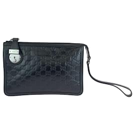 Gucci-Clutch em couro preto Guccissima da Gucci-Preto