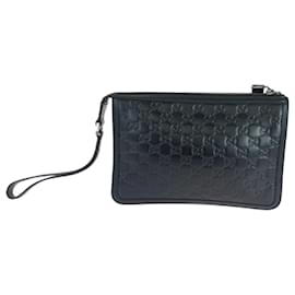 Gucci-Clutch em couro preto Guccissima da Gucci-Preto