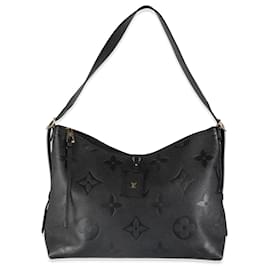 Louis Vuitton-Bolsa de viagem MM Empreinte Monogram Gigante Preta Louis Vuitton-Preto