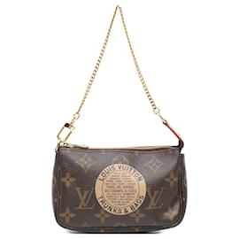 Louis Vuitton-Mini Pochette Accessoires Louis Vuitton em monograma marrom-Marrom