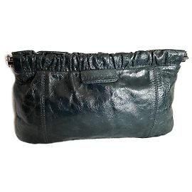 Gerard Darel Clutchs Verde oscuro
