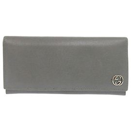 Cartera larga de cuero Gucci Interlocking G Castaño