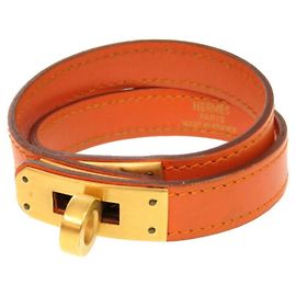 Hermès Pulseira Hermes Kelly Double Tour Swift Laranja G estampada Dourado Laranja