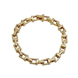 Tiffany & Co-Bracelet charm Tiffany T étroit en or jaune 18 carats-Autre