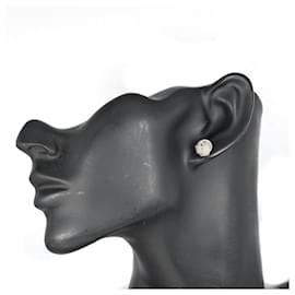 Tiffany & Co-Boucles d'oreilles en argent maillé en forme de nœud Tiffany & Co.-Argenté