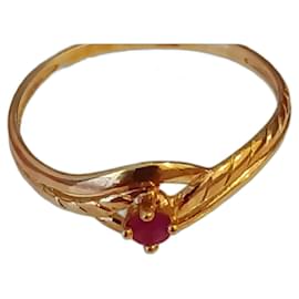 Autre Marque 18-carat gold ring set with a ruby Golden