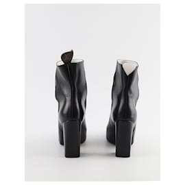 Louis Vuitton-Black leather boots-Black