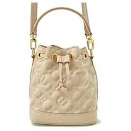 Louis Vuitton-Bolsa Nano Noé Monogram Empreinte Summer Stardust da Louis Vuitton-Bege