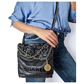 Chanel-Sac seau en cuir mini Chanel 22 noir-Noir