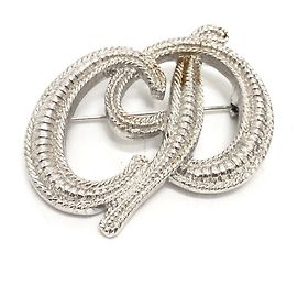 Broche de plata con logo de Christian Dior Plata