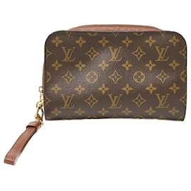 Louis Vuitton-Pochette en cuir Monogram Louis Vuitton-Marron
