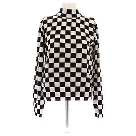 Pull Céline à carreaux en laine noir Noir