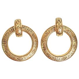 Chanel Orecchini a cerchio con clip in oro inciso D'oro