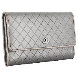 Chanel wallet in silver grey leather Grey