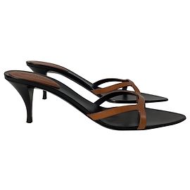 Saint Laurent Carla Mules in Black Leather Black