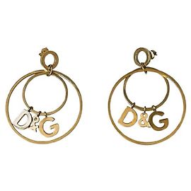 Brincos icônicos DOLCE & GABBANA em aço dourado com dupla argola Cru