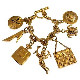 Pulseira de charme Chanel Vintage em ouro com ícones da sorte Gold hardware