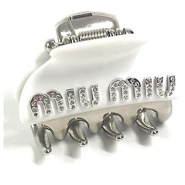 Clipe de cabelo com strass e logo Miu Miu Branco