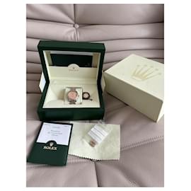 Rolex-Rolex Datejust 31 or rose et acier-Rose