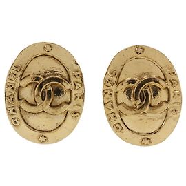 Boucles d'oreilles clips en plaqué or avec le logo Coco de Chanel Doré