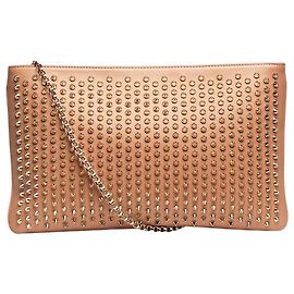 Christian Louboutin Clutch rosa con picos Rosa