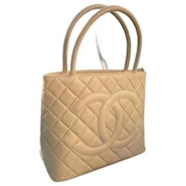 Chanel-CHANEL – Sac Médaillon vintage en cuir beige, chic & intemporel-Beige
