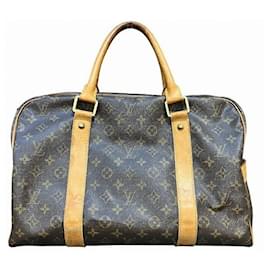 Louis Vuitton-Sac de voyage Monogram Louis Vuitton-Marron