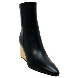 Chloé Botas Rebecca de cuero negro Chloe con tacón de cuña dorado Negro