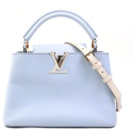 Bolsa Capucines BB Louis Vuitton Cru Roxo