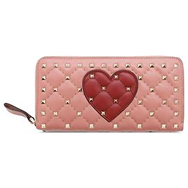 Cartera Valentino de piel de cordero rosa Rockstud Spike en forma de corazón con cierre alrededor. Rosa
