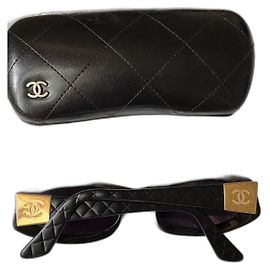 Gafas de sol Chanel Negro Dorado