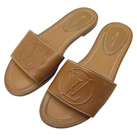 MULINI PIATTI LOUIS VUITTON LOCK IT 37 SANDALI IN PELLE GRANA CAMMELLO Cammello