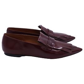 Céline Mocasines con flecos Celine en cuero burdeos Roja Burdeos