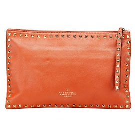 Valentino Garavani Valentino Rockstuds Leather Clutch Bag Orange