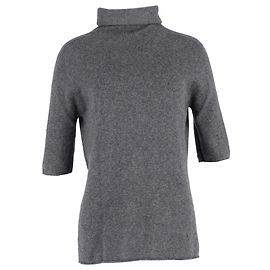 The row Der Rollkragenpullover aus grauer Wolle Grau