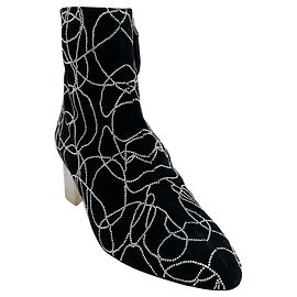 Alaïa Botinhas de camurça preta Alaia com cristais e salto transparente Preto