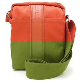 Hermès-Sac à bandoulière PM Acapulco d'Hermès-Orange