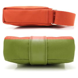 Hermès-Sac à bandoulière PM Acapulco d'Hermès-Orange