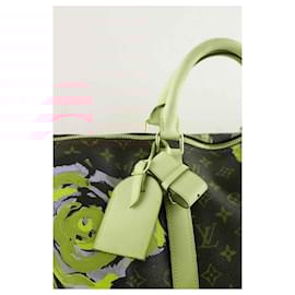 Louis Vuitton-Leather travel bag-Brown