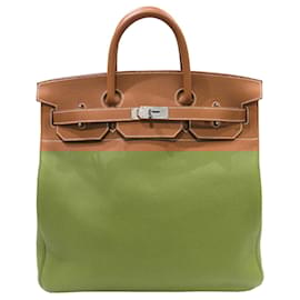 Hermès-Sac à main Hermes Haute Couture 40 en cuir Togo doré-Doré