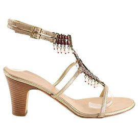 Saltos Giuseppe Zanotti em couro dourado Dourado