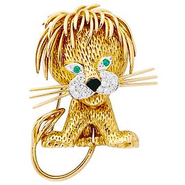 Clip Van Cleef & Arpels, "Leone Ebouriffé", oro giallo, smeraldo, diamanti. Altro