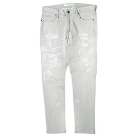 & Other Stories Pantalones de mezclilla boyfriend tapered de algodón elástico Otro Gris