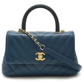 Sac 2 en 2 Chanel Coco Handle en cuir chevron Bleu Autre